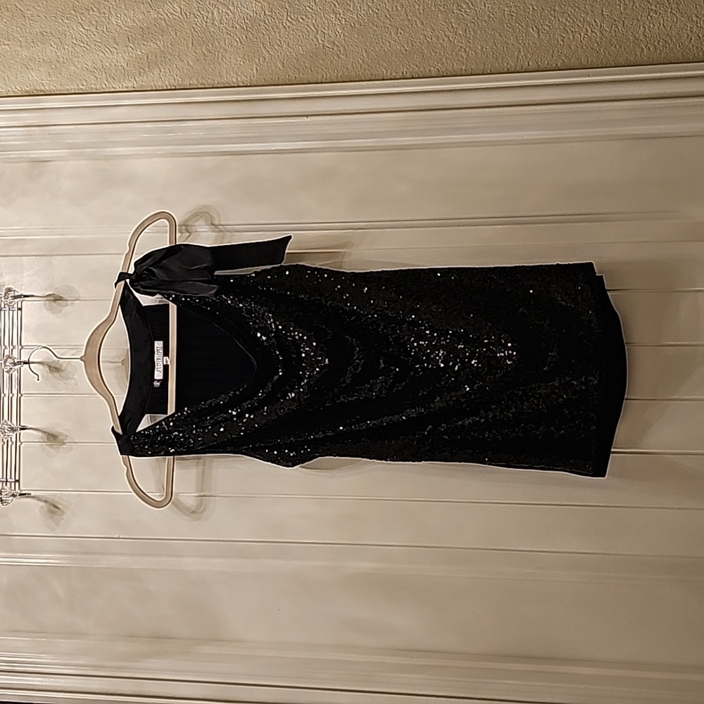 Black finely sequined top.